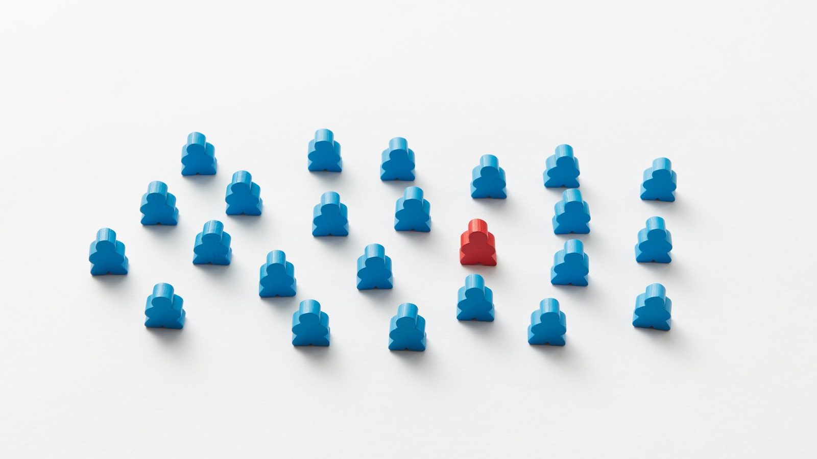 One red figure among many blue ones, the way a single brand is named in an answer while the rest of the category is not