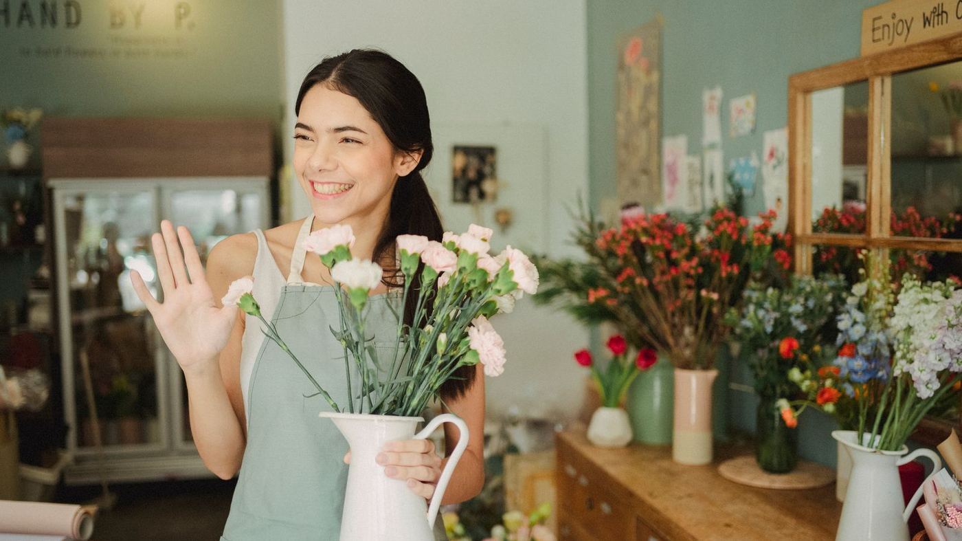 A florist with the thing she actually sells, which is what a brand specification has to describe